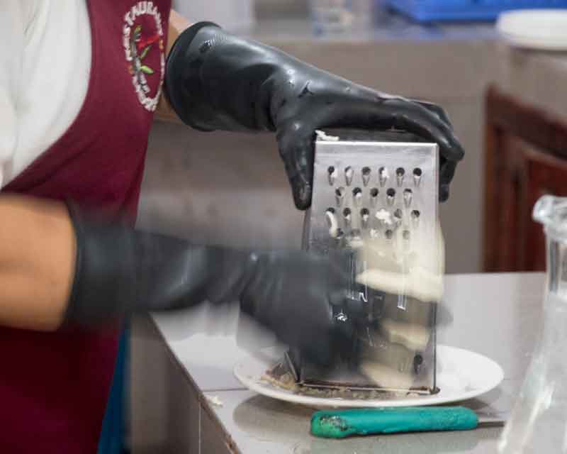 Grate the cheese. Grate the cheese; recipe for tigrillo.